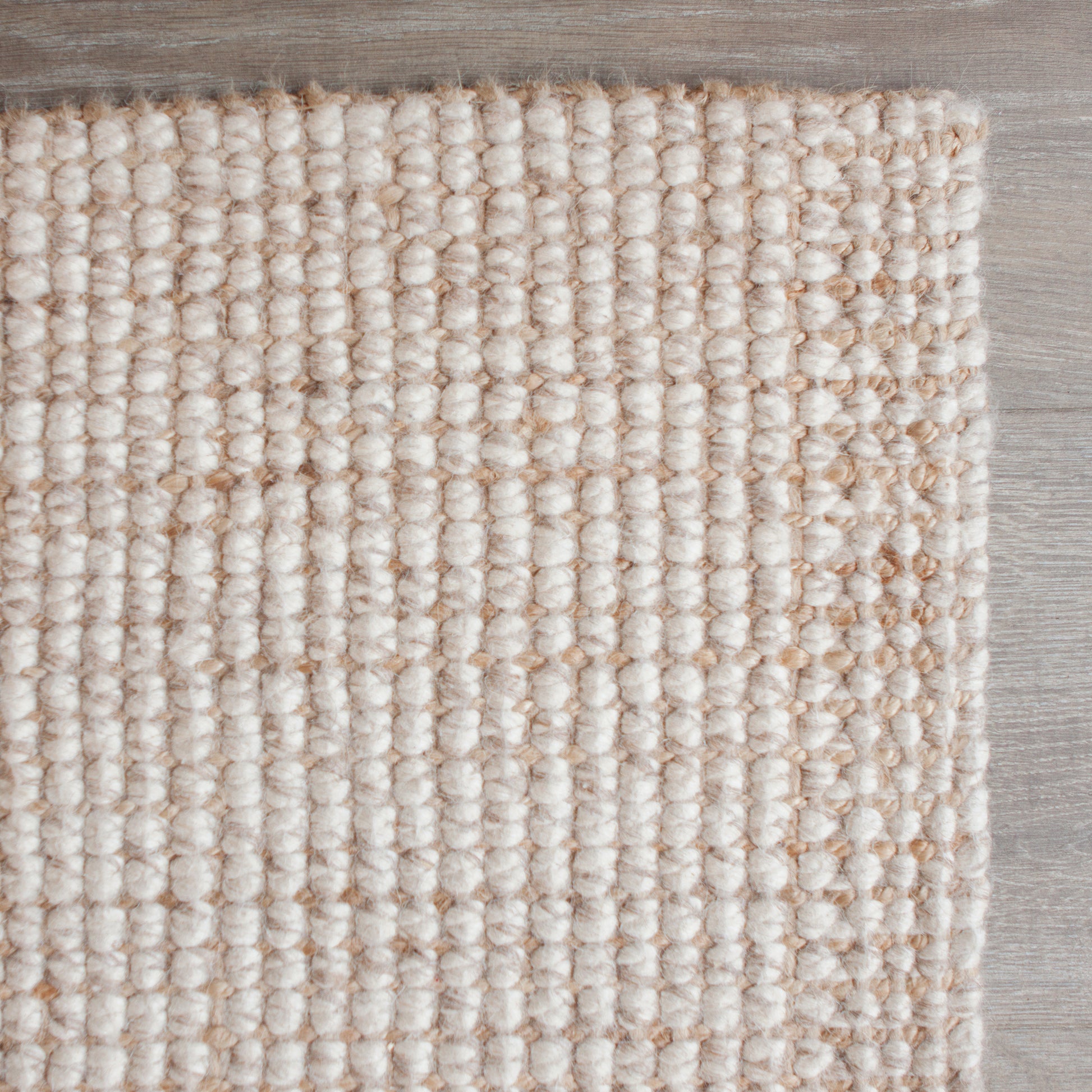 For a more sumptuous feel under foot these Wool and Jute hand-woven floor rugs are hard to beat. Our combination of the heavy weave and the soft appearance of pure wool make a wonderful, luxurious, exotic-looking floor rug suitable for any area in the home. Colour: Natural  Made in India. Available in 6 sizes.